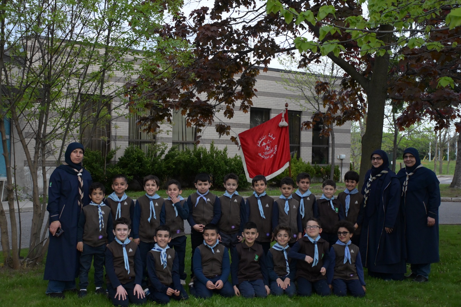 Scouts group photo with flag